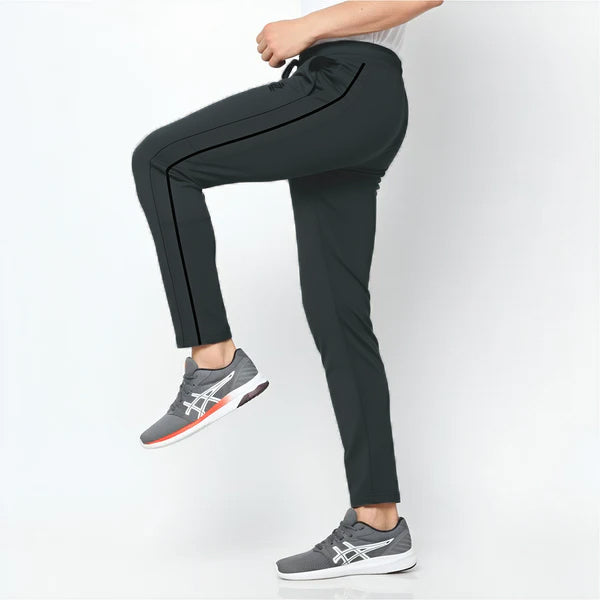 Person wearing smoke grey skkiny trouser